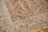 Even wear on terra cotta and aqua Herati floral motifs of vintage Sivas carpet.