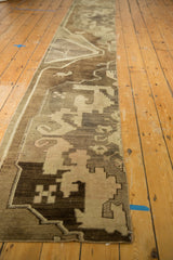 Fragmented vintage Oushak runner showing coffee brown, antique ivory, and blush rectilinear patterns.
