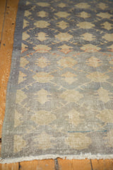 Distressed Sparta runner detail of worn lattice-floral pattern, abrashes, and visible foundation.