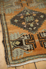 Distressed Oushak rug: low pile texture with rust, mint, brown germinating plants.