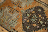 Vintage distressed Oushak rug, stepped medallion, floral pattern, oxidized silver, pale orange, mint.