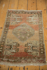 Distressed Oushak rug mat pile, revealing foundation, time-softened copper, and beige tones.