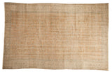 Vintage Distressed Oushak carpet with an allover faded orange field and subtle floral vinery.