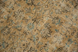Distressed vintage Oushak carpet pile with floral vinery, beige tones, and foundation wear.