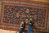 Antique Serbend rug with dense allover pattern of splayed floral motifs and vinery.