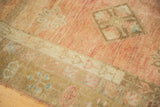 Soft, abrashed low pile vintage Oushak rug detail, with blush, pale bronze, powder blue motifs.