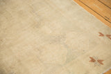Even low pile and knot head texture on a distressed Oushak rug with sparse copper motifs.