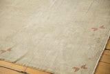 Even low pile texture showing knot heads and copper pinwheel details on a vintage Oushak rug.