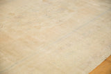 The even, low pile and soft, time-softened texture of a vintage Oushak carpet.