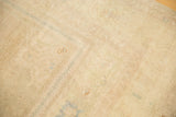 Even low pile and visible knot heads on the distressed vintage Oushak carpet.