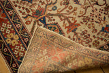 Hand-knotted Afshar rug detail showing reverse foundation and ivory tree-of-life pattern.
