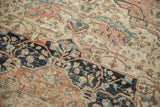 Antique Farahan Sarouk rug, floral vinery in navy, antique ivory, dusty teal, and even wear.