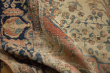 Hand-knotted Antique Farahan Sarouk rug, visible foundation through worn navy and terra cotta floral pile.