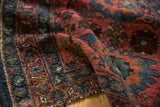 Close-up of the Lilihan rug runner's intricate floral vinery in dusty raspberry and sky blue.