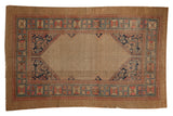 Antique Persian Serab rug, beige lattice field, Herati spandrels, wide blue blush borders.