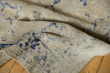 Distressed Oushak runner texture with low pile, navy blue patterns, and secure ends.