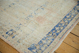 Textured vintage Distressed Oushak rug pile with mostly even wear, ivory, dusty apricot, and navy blue.