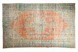 Vintage distressed Oushak rug, terra cotta red orange medallion, floral vinery, blue borders, 5'9