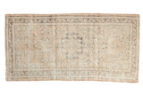 Distressed vintage Oushak runner with faded medallion, palmettes, pale sand beige. 2'3