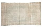 Distressed Oushak rug runner, faded roundel medallion in muted seafoam, ivory, and beige.