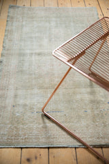 Distressed Oushak runner texture with mostly wear across to knot heads and soft muted tones.