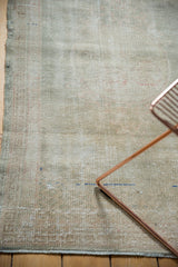 Distressed Oushak runner, mostly wear across knot heads and foundation, with dusty seafoam and ivory.