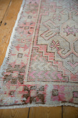 Distressed Oushak runner pile, showing even wear, exposed foundation, pink, silver geometric motifs.