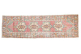 Distressed Oushak runner, faded rose abrashed field, ivory medallions, sea-foam green border, 3x9.5 feet.