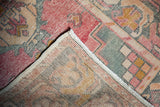 Distressed pile reveals knot heads and foundation, folded to show woven reverse side.