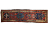 Antique Northwest Persian runner, triple navy medallion, cherry red floral field, low pile, 3'2