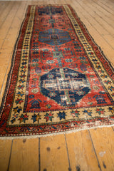 Fringe and star-motif border of antique Northwest Persian runner, showing low pile and foundation.