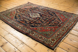 Vintage Engelas rug, secured side edge detail with brick red and cream border.