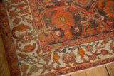 Even, low pile and knot heads visible on this antique Persian Malayer rug corner.