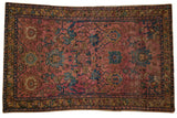 Antique Lilihan rug, raspberry red field, allover palmettes and lotus flowers.