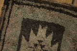 Thick pile texture of vintage Oushak rug, chocolate brown and seafoam concentric starburst pattern.