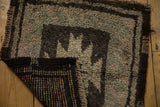 Thick pile vintage Oushak rug, revealing secure dark brown edge and hand-knotted foundation.