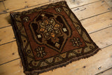 Vintage Oushak corner with beige geometric border, copper field, and tangerine floral motifs.