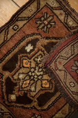 Hand-knotted Oushak rug's secure edge and striped woven foundation.