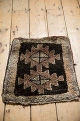 Geometric zigzag border and thick pile of a vintage Oushak rug, charcoal, mauve, beige tones.