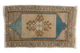Distressed Oushak rug mat with beige, grey, and teal rams horn medallion, 1'8
