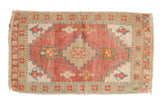 Distressed vintage Oushak rug mat, stepped medallion in pink, seafoam, ivory. 1'8
