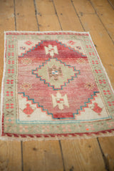 Vintage Distressed Oushak rug texture and geometric pattern in pale cochineal, seafoam, and ivory.