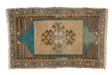 Vintage distressed Oushak rug with beige field, aqua rams horn design, and grey geometric border.