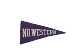 Vintage purple felt Northwestern University pennant with white 'NO. WESTERN' text, 4x8.