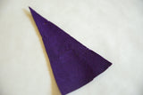 Detail of textured purple felt on the vintage Northwestern pennant, showing pinholes.