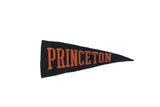 Vintage Princeton felt pennant, black with orange 'PRINCETON' text, circa 1950s, 4x8 inches.