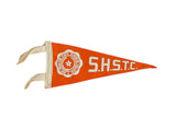 Mini vintage orange felt pennant displaying white SHSTC lettering and university seal, 4x8 inches.