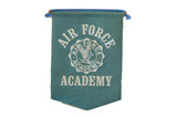 Vintage 1950s Air Force Academy felt banner in teal with white eagle emblem.