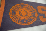 Vintage Syracuse felt pennant: university seal in orange, showing laurel wreath and founding date.
