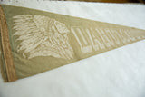 Cream graphic of Native American in headdress on faded green vintage Dartmouth pennant.